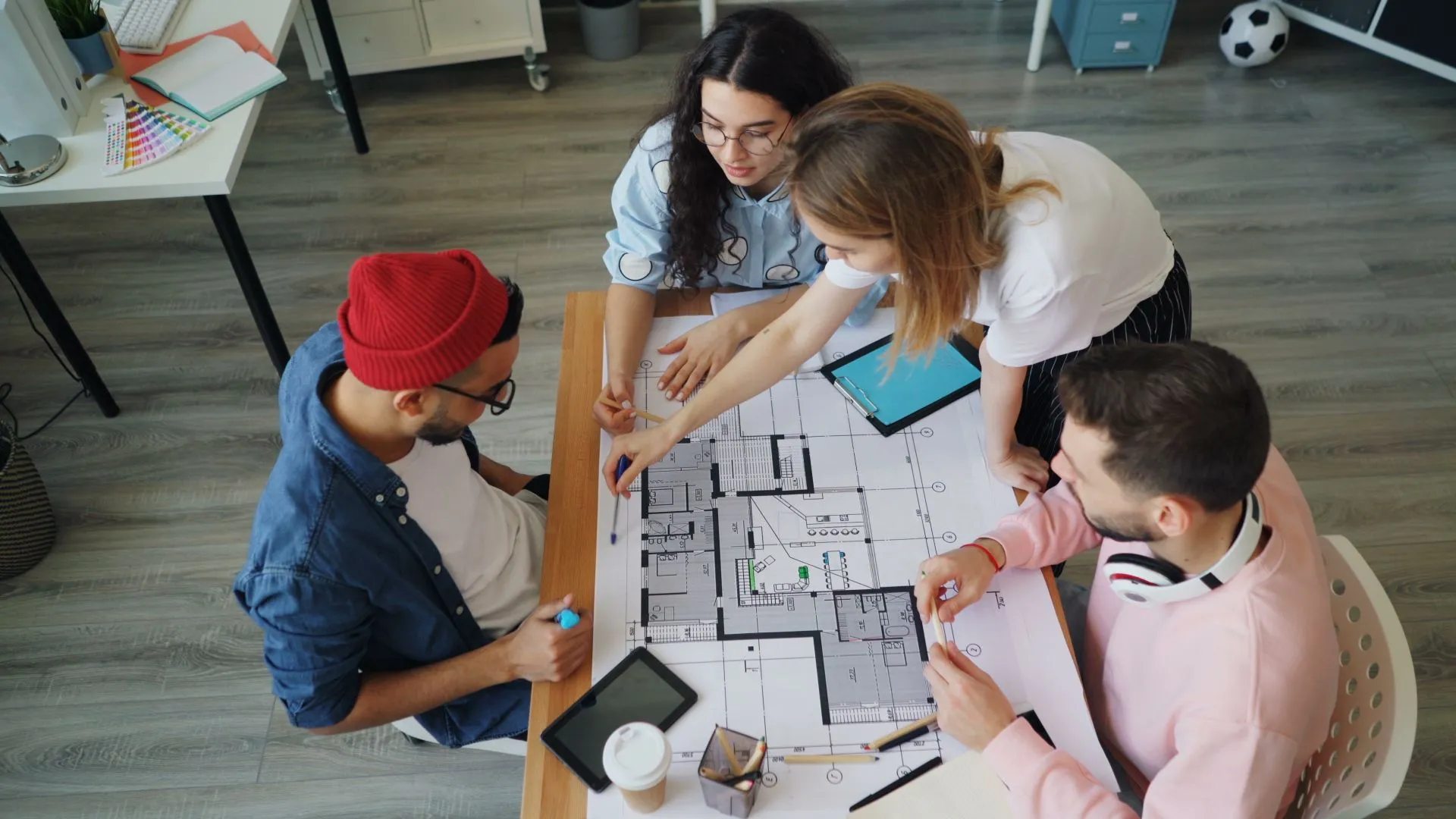 Architects and engineers reviewing design drawings