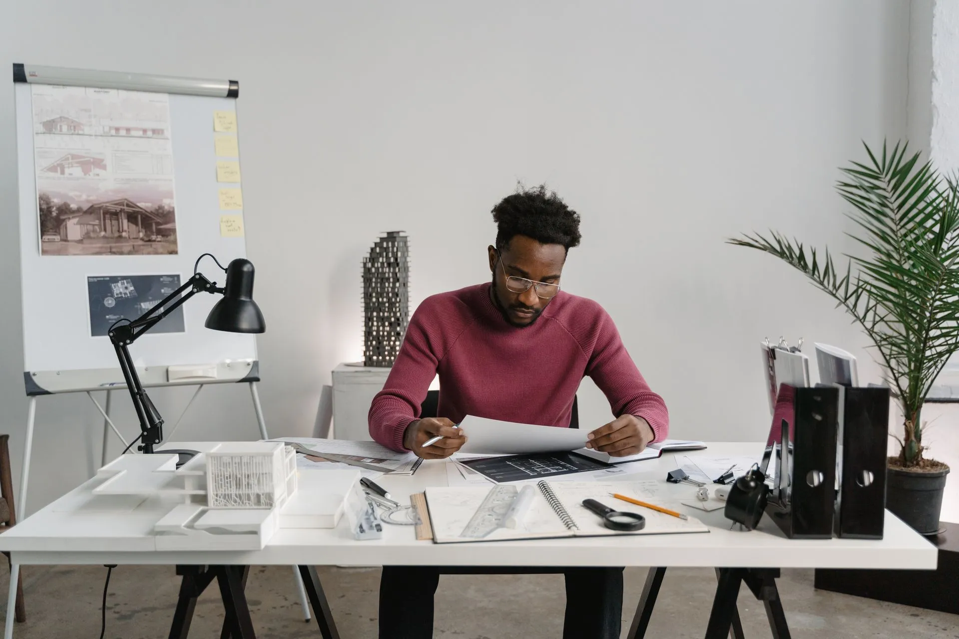 Person working on a laptop in an office