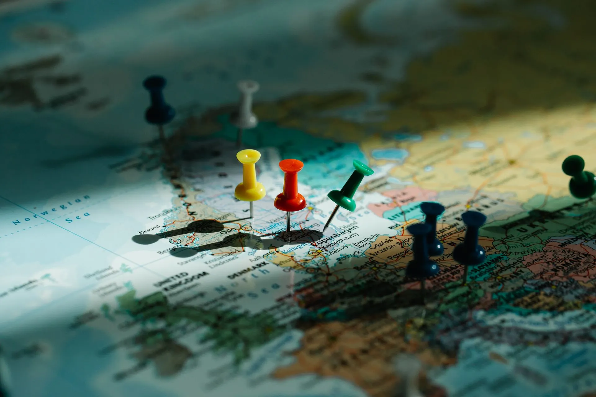 Push pins marking locations on a map