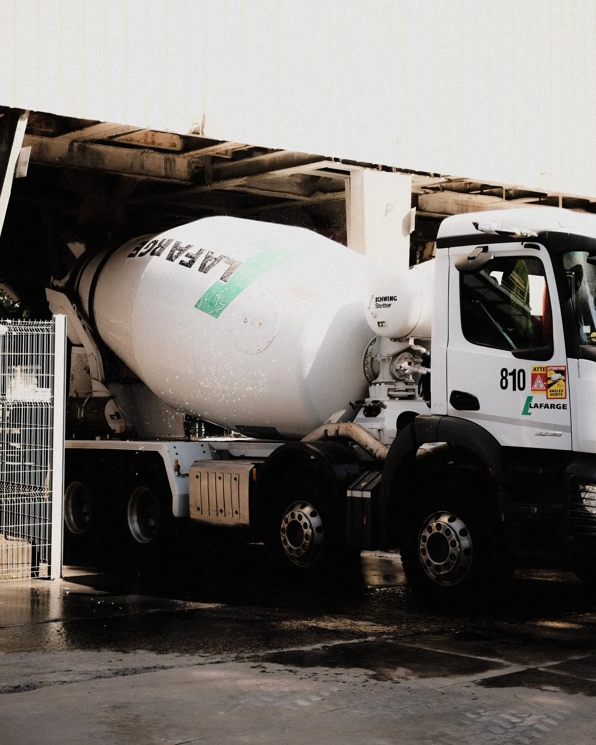 Cement mixer truck at a construction site